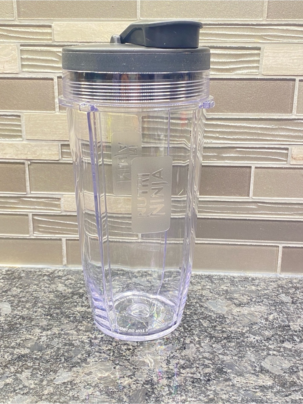 Ninja Clear Plastic Blender Cup with Black Flip Top Lid 24oz.
